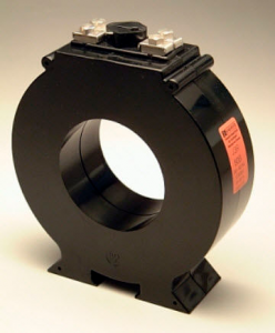 A typical current transformer. A conductor is passed through the hole, and an output is provided for indirect current measurement by an instrument. 